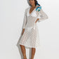Model wearing Astrid Longline Lace Dress in color white