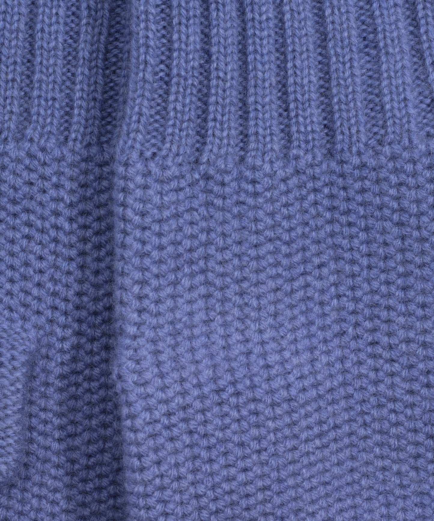 The Crosby Handwarmer in color denim blue