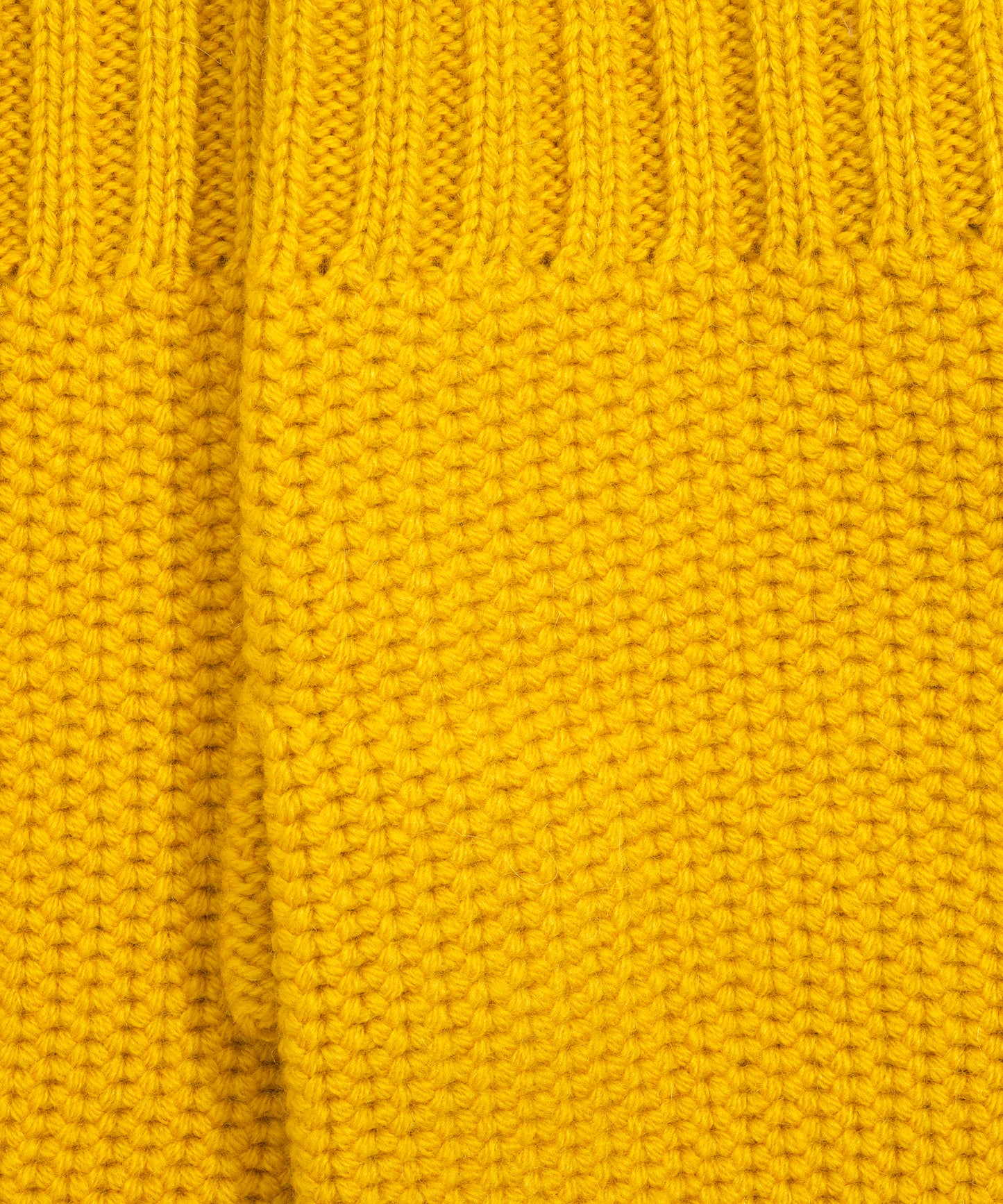 The Crosby Handwarmer in color yellow ochre