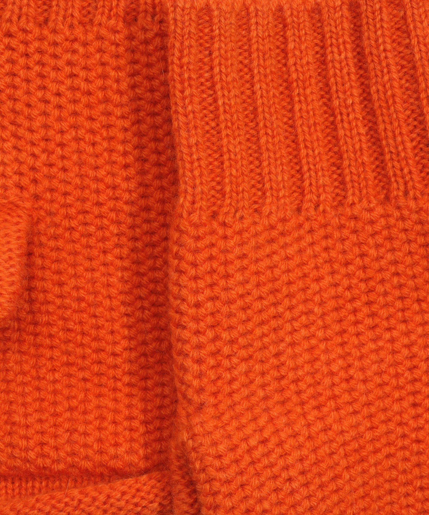 The Crosby Handwarmer in color harvest pumpkin