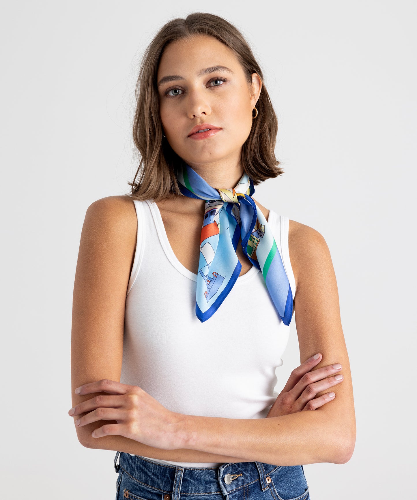 Model wearing Portovenere Silk Bandana in color Sea Blue