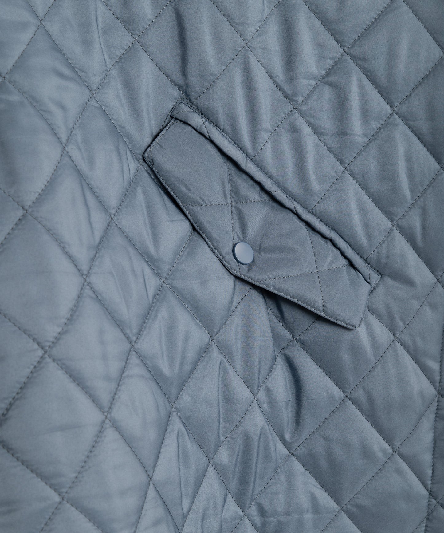 Quilted Poncho in color denim blue