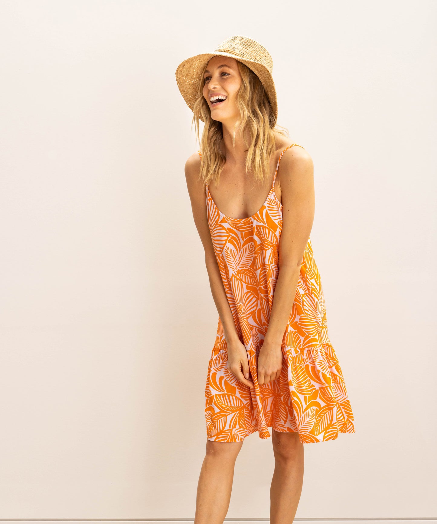 Raffia Packable Bucket Hat in color Natural on a model