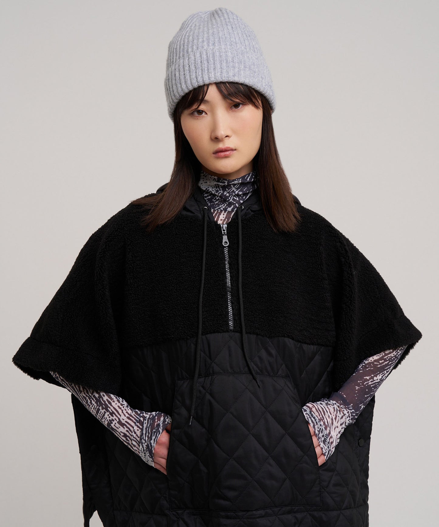 Combo Quilted Hooded Poncho in color black
