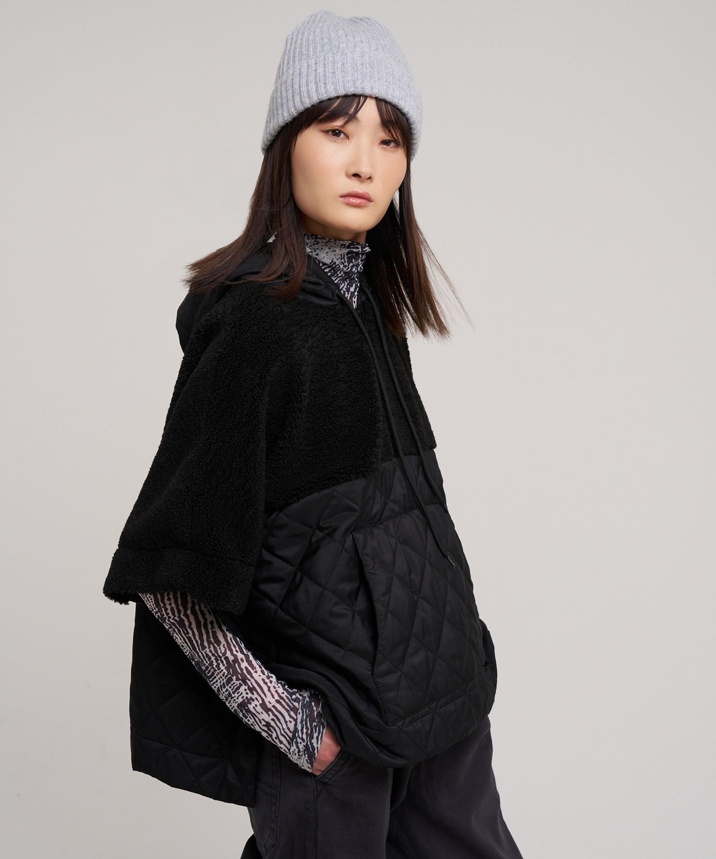 Combo Quilted Hooded Poncho in color black