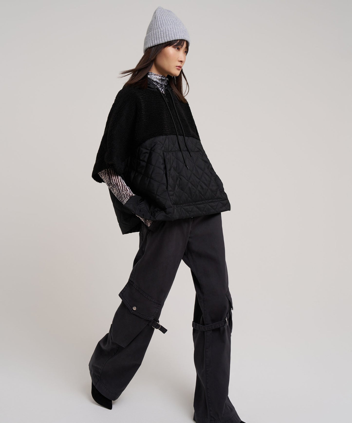 Combo Quilted Hooded Poncho in color black