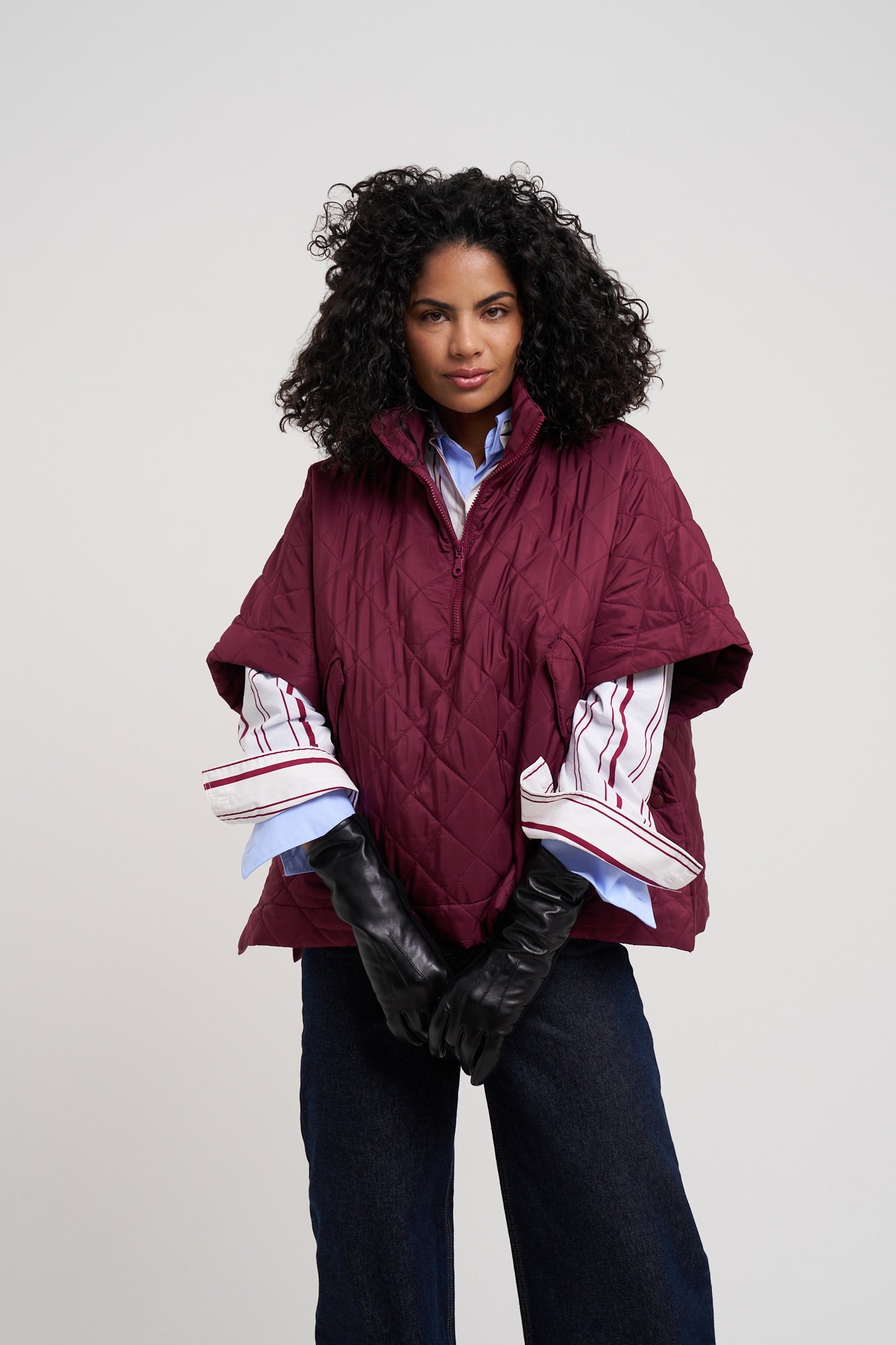 Quilted Poncho in color winter berry
