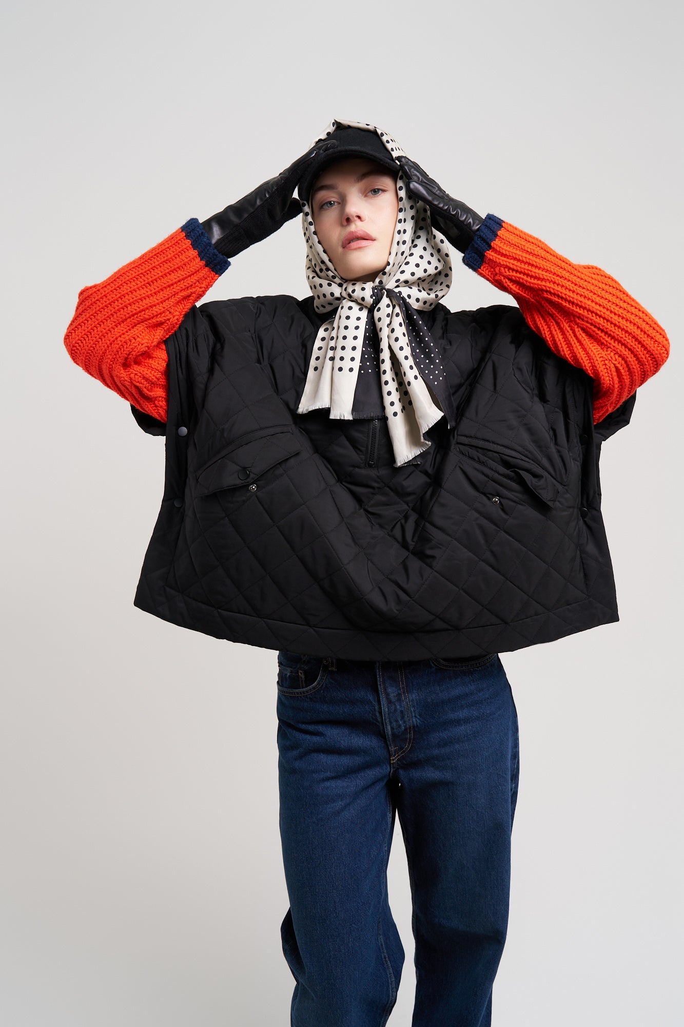Quilted Poncho in color black