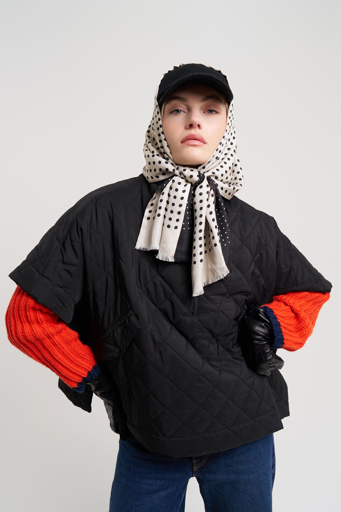 Quilted Poncho in color black