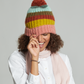 Rainbow Stripe Hat With Pom in color Cinnamon