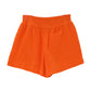 Supersoft Gauze Smocked Shorts in color tangerine