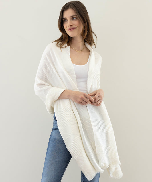 Pleated Plaid Milk Wrap in color Ivory on a model