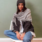 Wool/Cashmere Blend Triangle Fringe Wrap in Gray Heather on a model