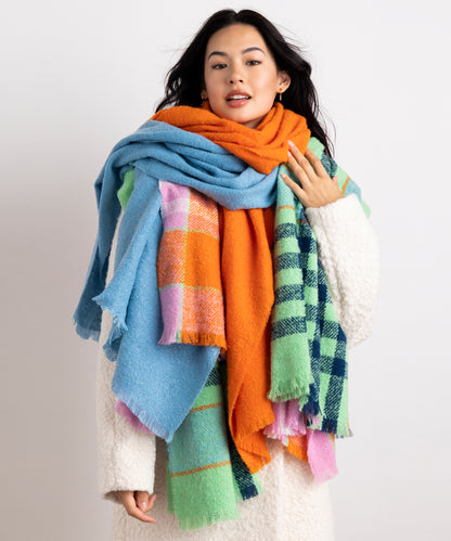 Buzzy Plaid Scarf in color Cream on a model