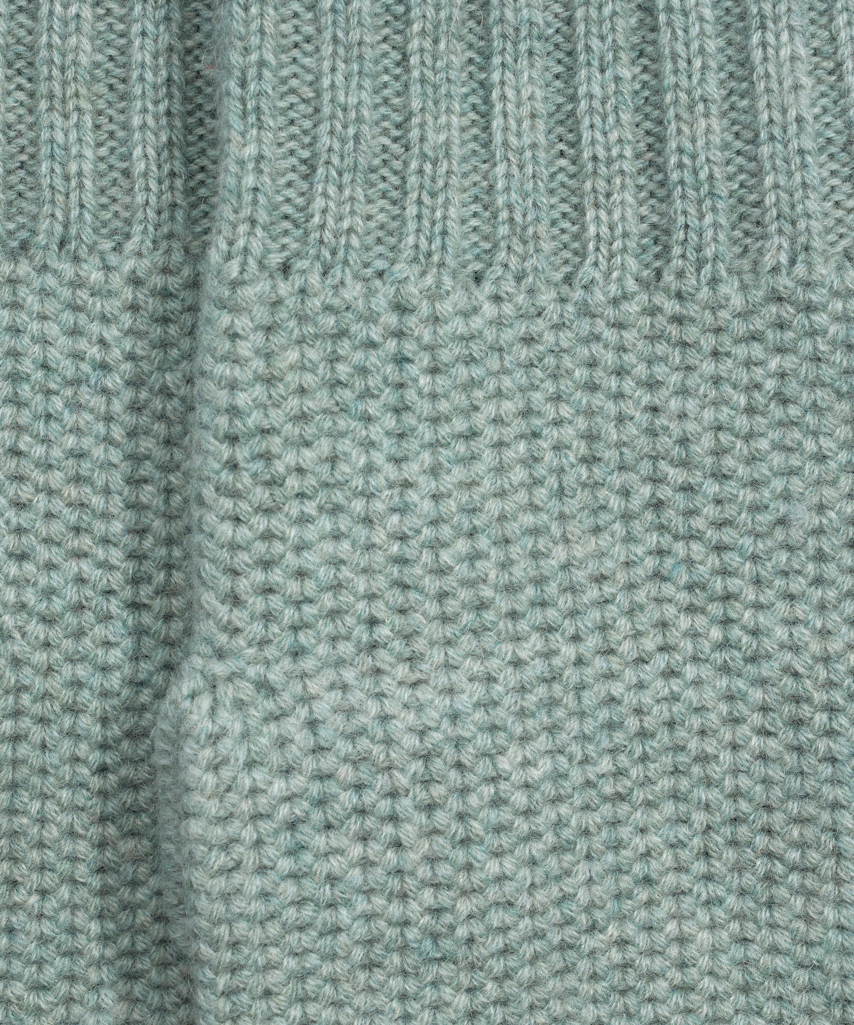 The Crosby Handwarmer in color english moss