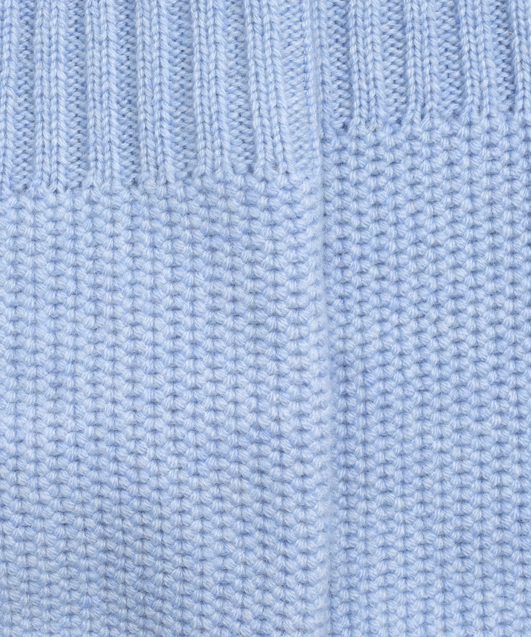 The Crosby Handwarmer in color placid blue