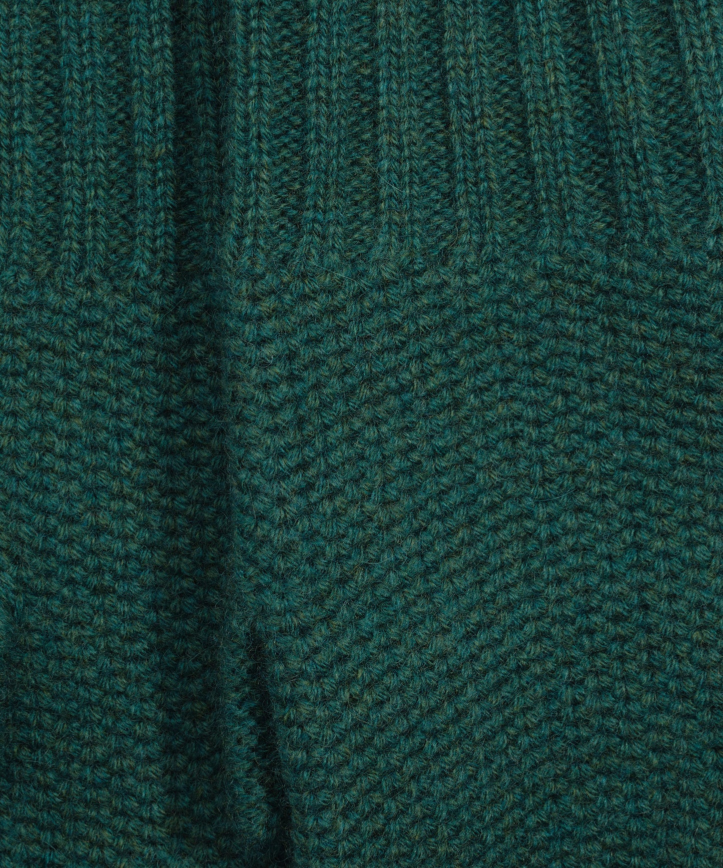 The Crosby Handwarmer in color tourmaline