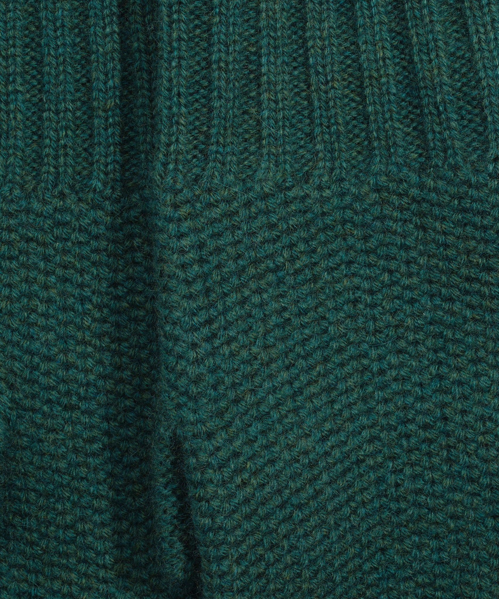 The Crosby Handwarmer in color tourmaline