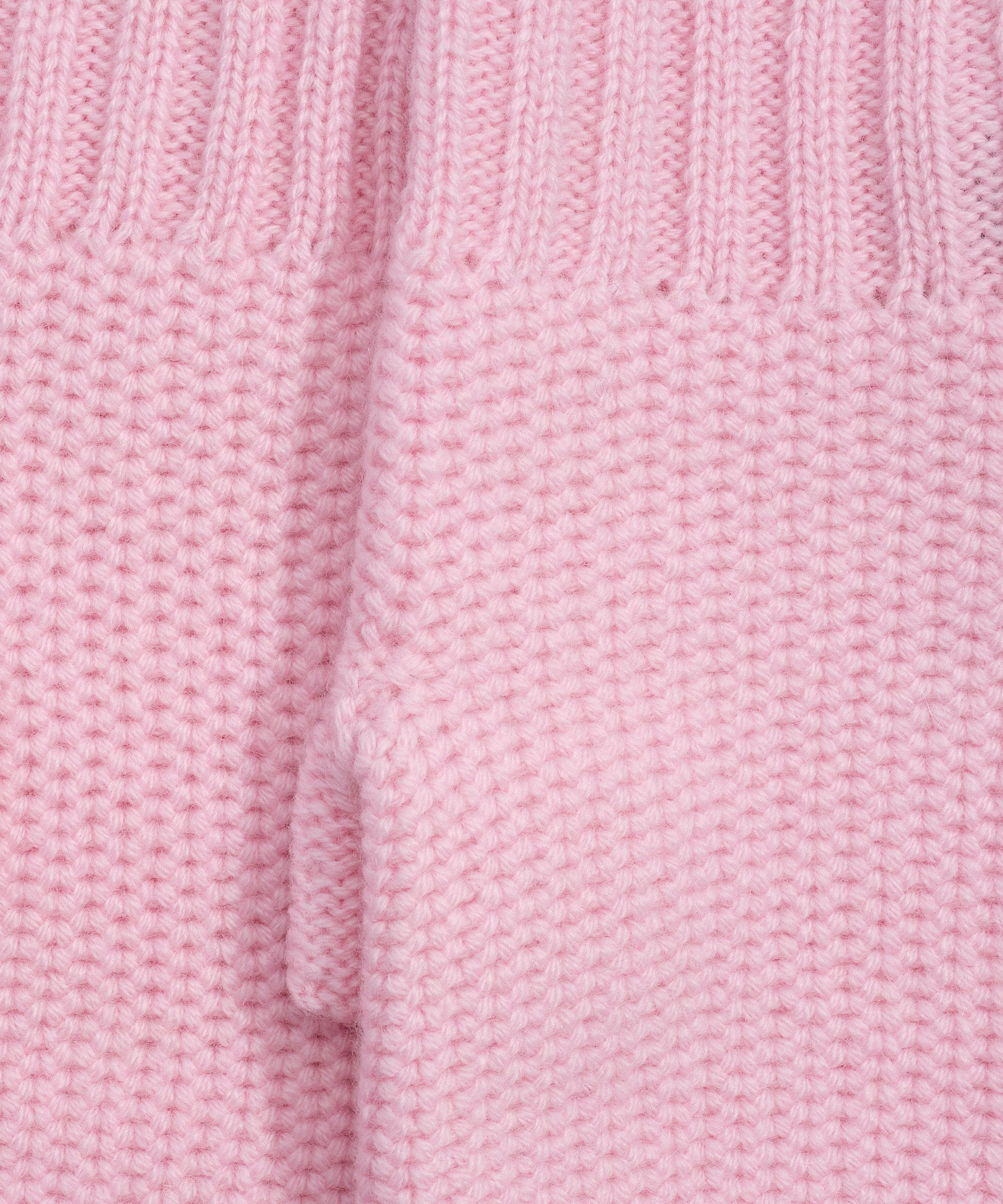 The Crosby Handwarmer in color powder pink