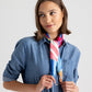 Model wearing the Mosaic Stripes Pleated Diamond in color Multi around her neck