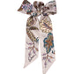 Falling Leaves Ribbon Scarf in color silver