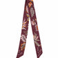 Falling Leaves Ribbon Scarf in color fig
