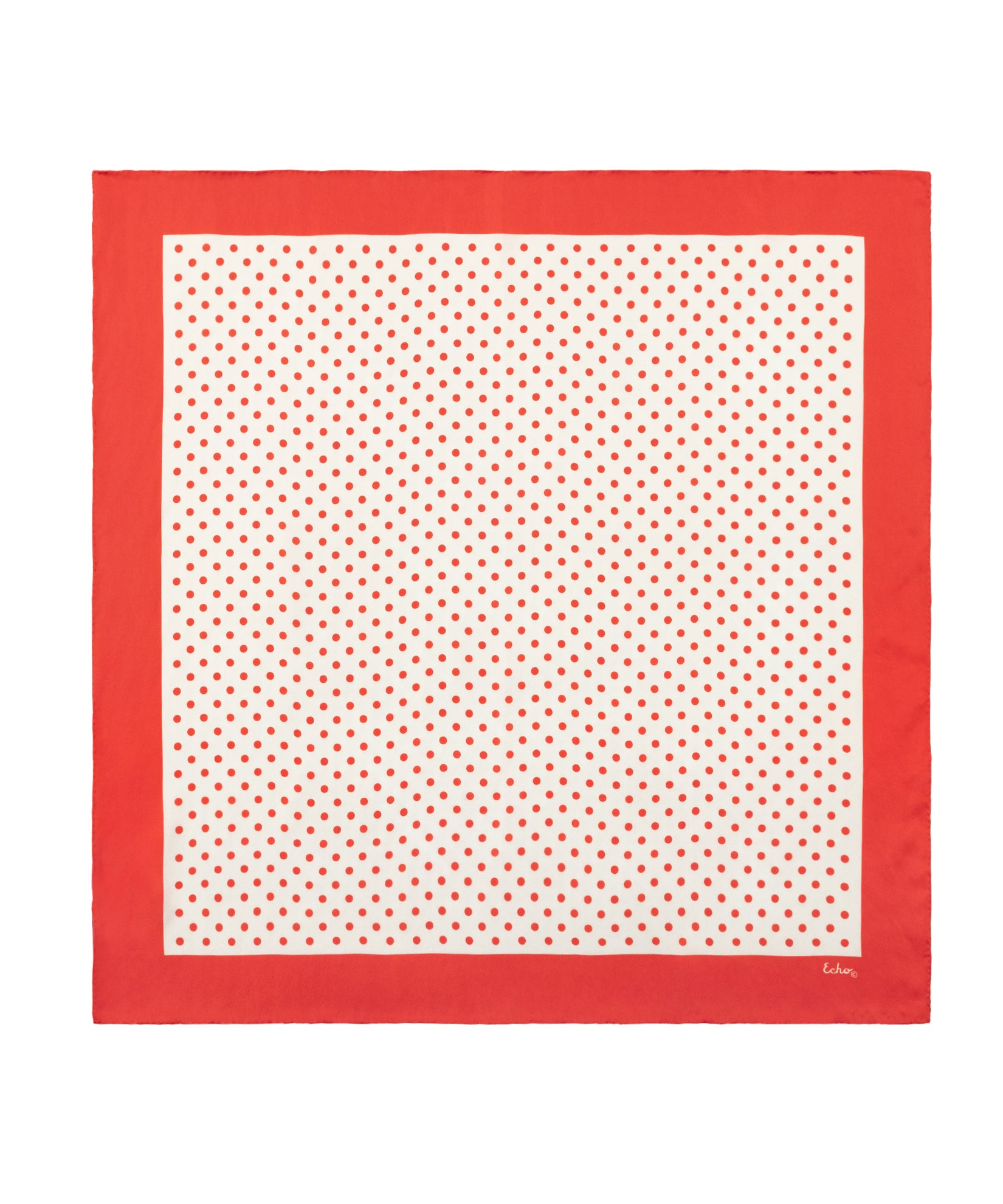 Red and white polka dot scarf on a white background