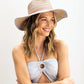 Striped Sun Hat in color Blue Gray on a model