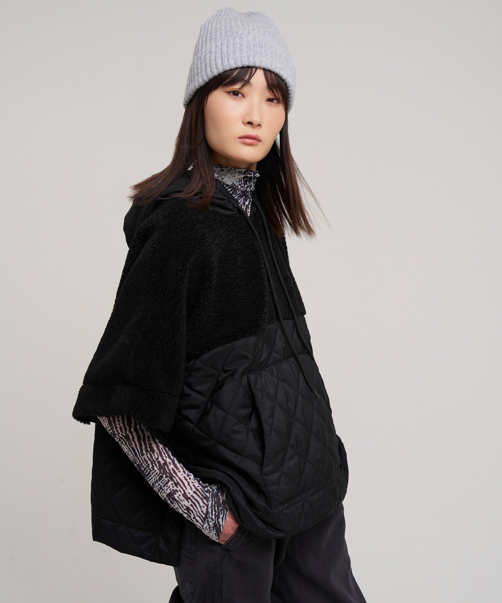 Combo Quilted Hooded Poncho in color black