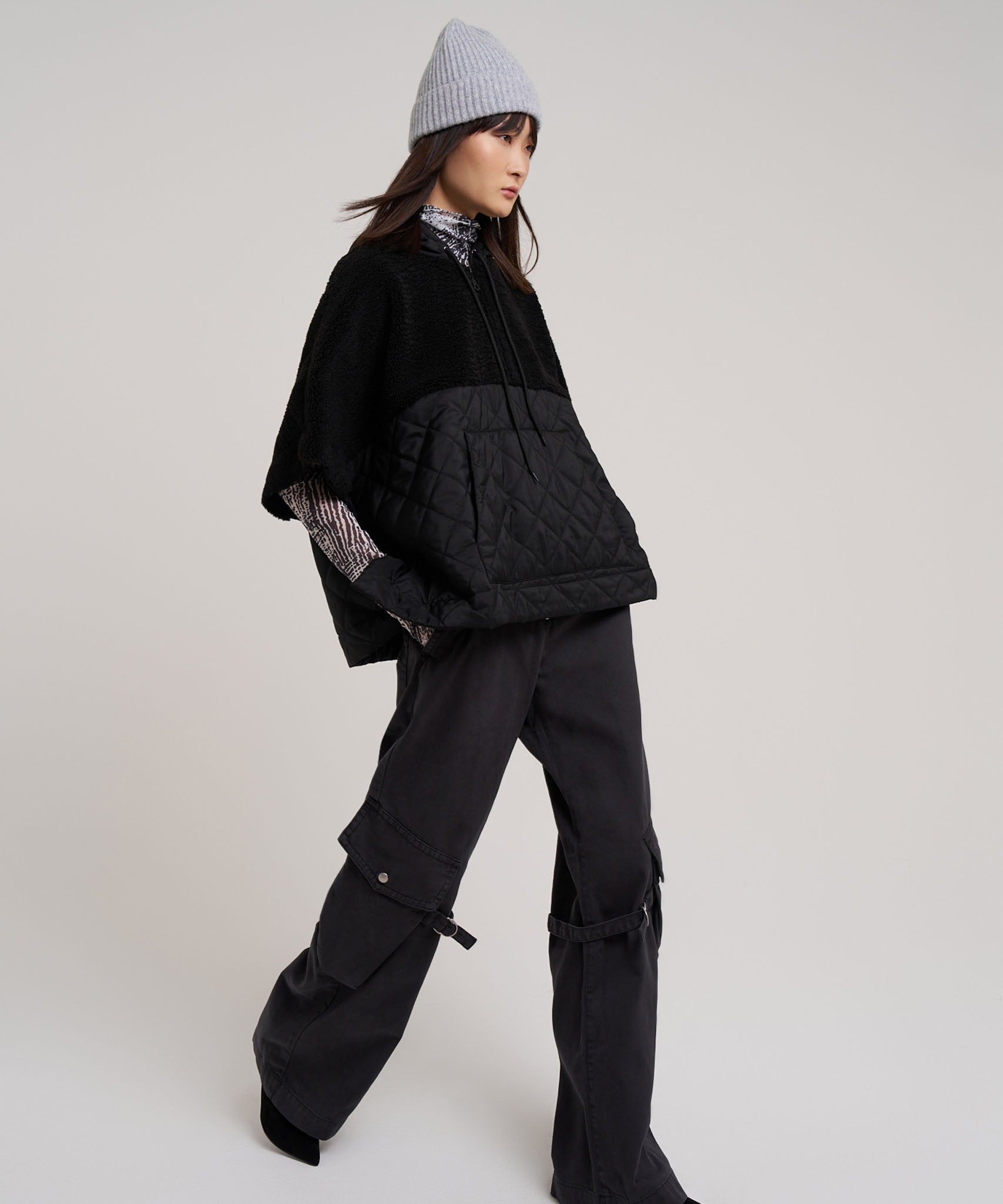 Combo Quilted Hooded Poncho in color black