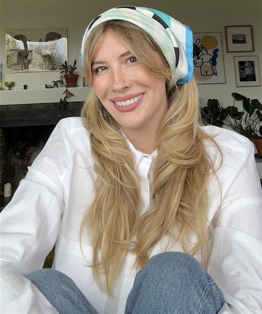 Emily Henry wearing her echo100 scarf design