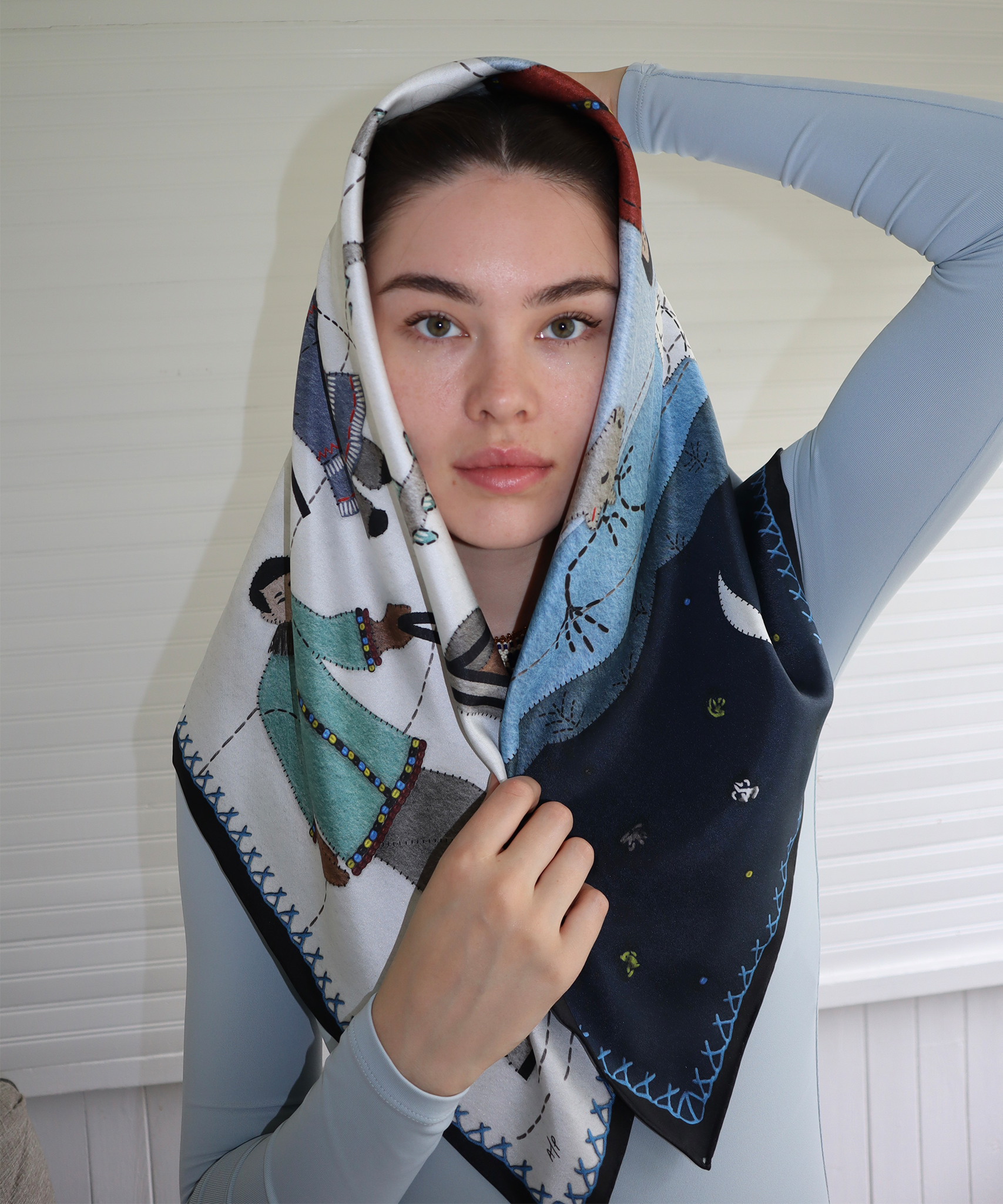Willow Allen wearing her echo100 scarf design on her head