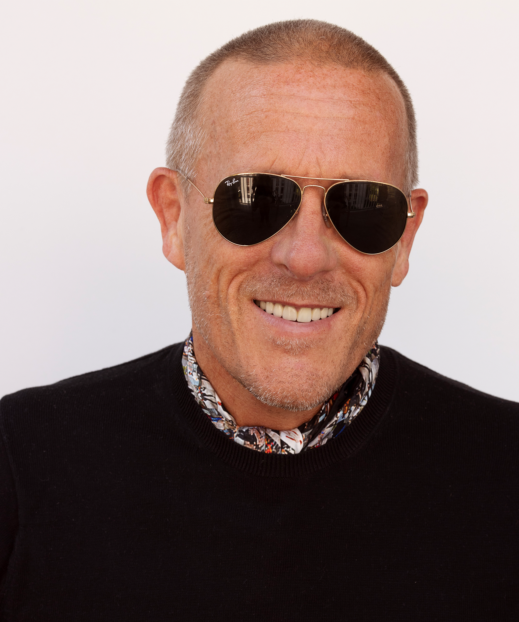 Scott Schuman wearing his echo100 scarf design