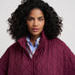 Quilted Poncho in color winter berry