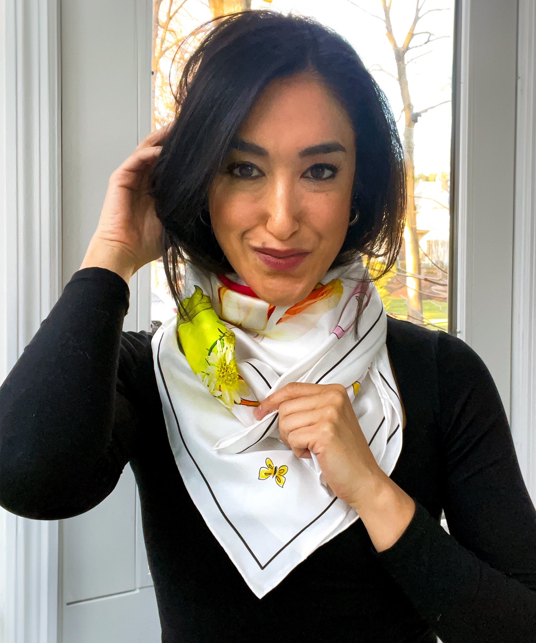 Meredith Wing wearing her Echo100 scarf "Garden Party"