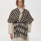 Bordered check ruana in black