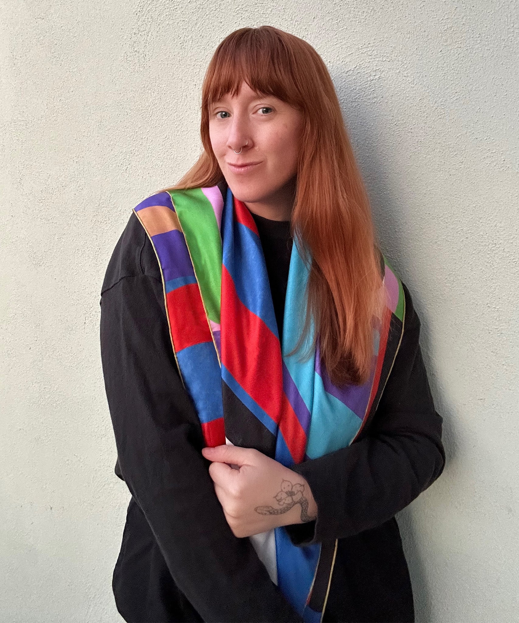 Kelsey McKinney wearing her echo100 scarf design