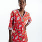 Wanderlust Tunic Dress in color Hibiscus on a model