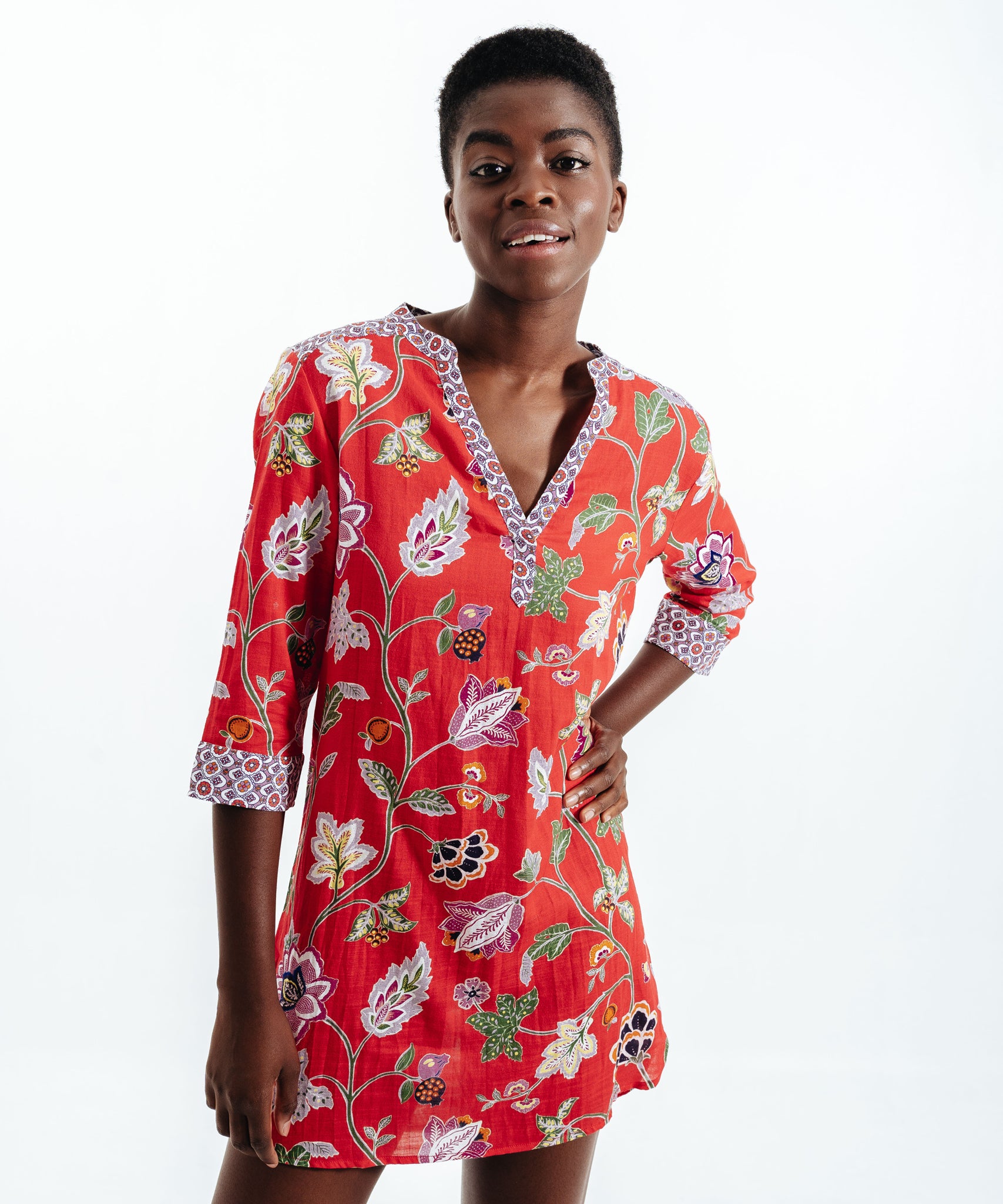 Wanderlust Tunic Dress in color Hibiscus on a model
