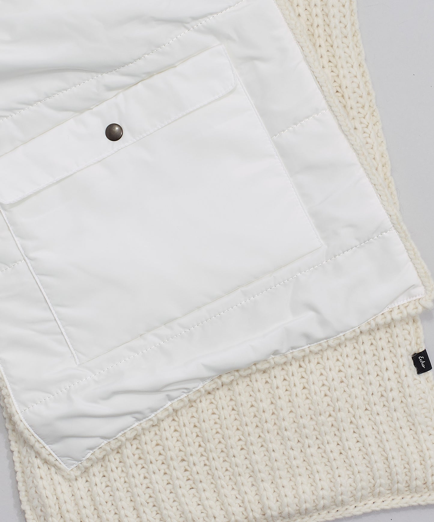 Reversible Muffler With Pockets in color Echo Ivory