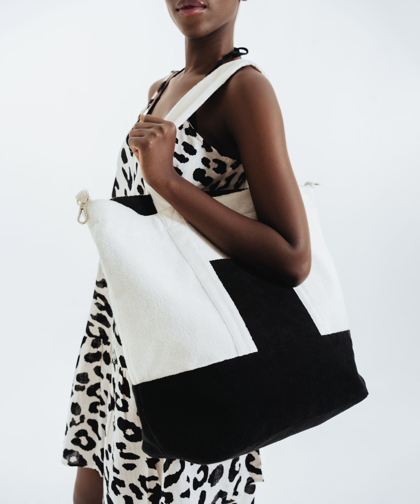 Terry Block Rocker Tote in color Black/Cream on a model